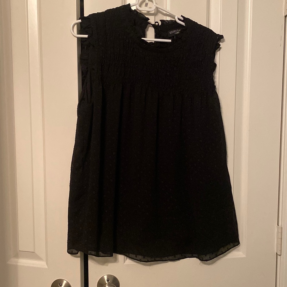 Black polka dot sleeveless top